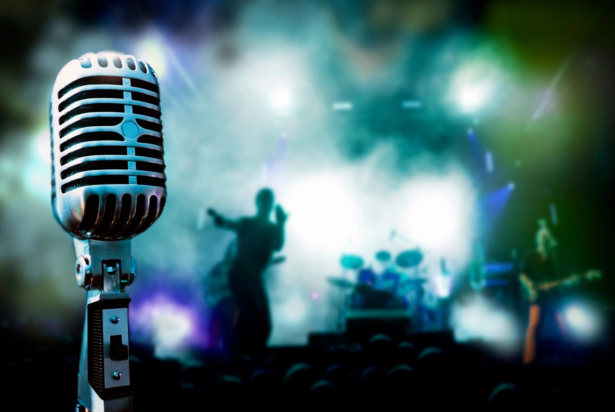 Vintage chrome microphone on concert stage